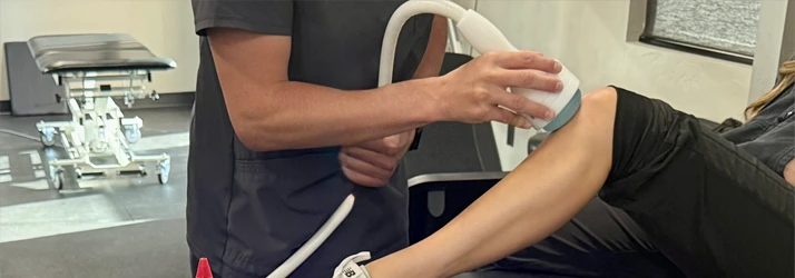 Extracorporeal Focused Shockwave Therapy being performed on patient